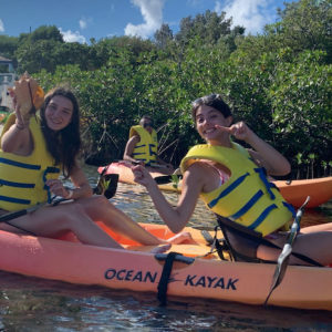 Abby Morgan (left), a senior biology major from Tullahoma, Tennessee, and Bridget Sprandel, a junior biology major from Crystal Lake, Illinois, show off a live conch they discovered while exploring an estuary on the Bahamian island of Half Moon Cay. The Ole Miss students participated in an Island Biogeography course in the Caribbean during the 2022 Wintersession. Submitted photo