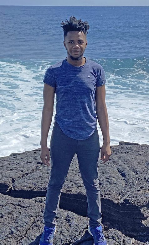 Jaylen Powell, a recent UM biology graduate from Lambert, stands on lava rock overlooking the Pacific Ocean while in Hawaii for a 2020 Study USA course on Life at the Interface; Microbes, Volcanoes and Culture. Submitted photo