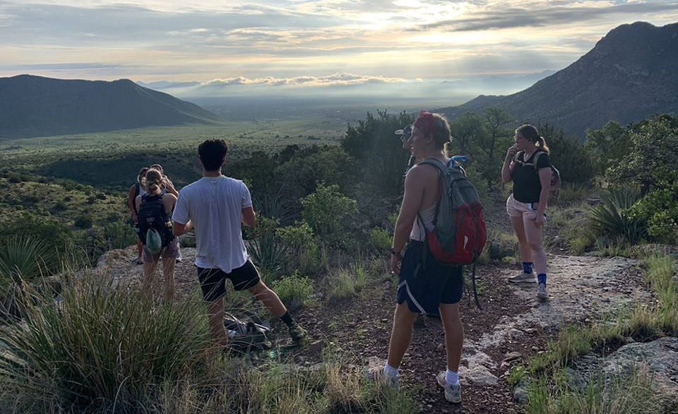 Students in professor Jason Hoeksema’s Ecology and Evolution of Sky Island Biodiversity course catch their breath and take in the view during a hike in the Chiricahua Mountains of Arizona. Photo by Jason Hoeksema/UM Department of Biology